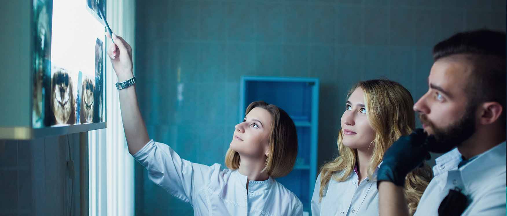 dentists looking at x rays