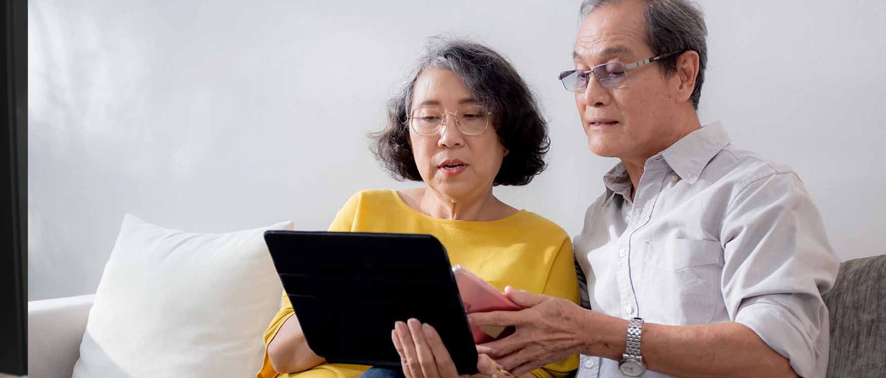 seniors together with a tablet