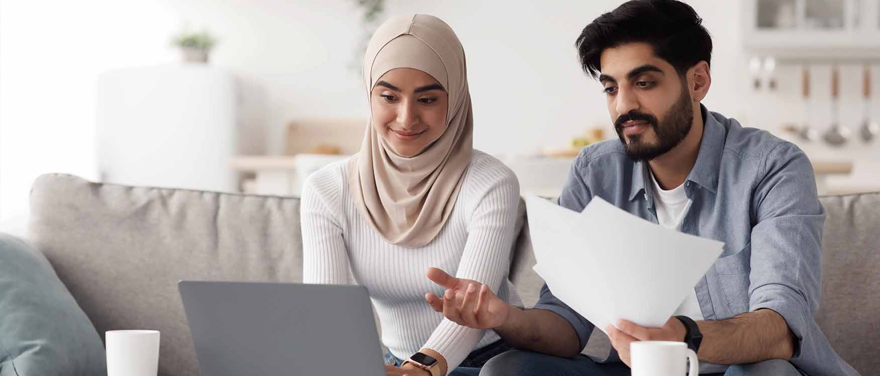 Man and woman at laptop
