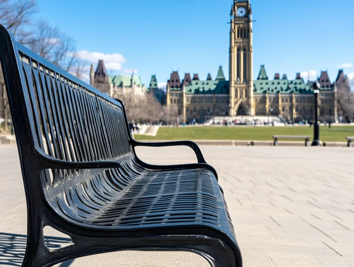 Empty park bench with the Parliament Buildings in the background